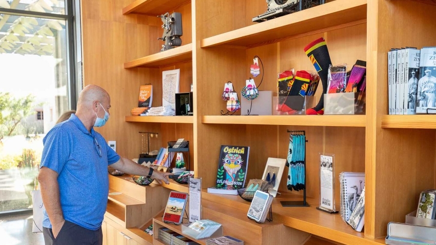 Man Browsing at the Chandler Museum Store