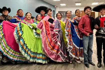Ballet Folklorico dancers from Chandler High lined up in a row