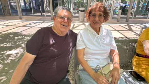Golden neighbors (man and woman) during a prior Golden Neighbors event