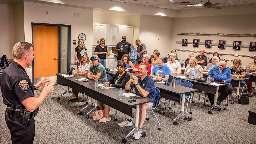 Chandler Police addressing attendees during last year's GAIN kickoff event