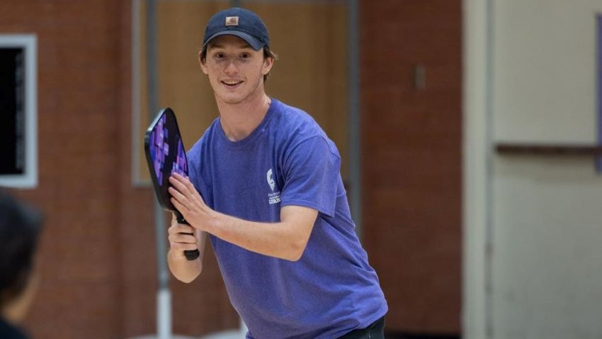 teen playing pickleball