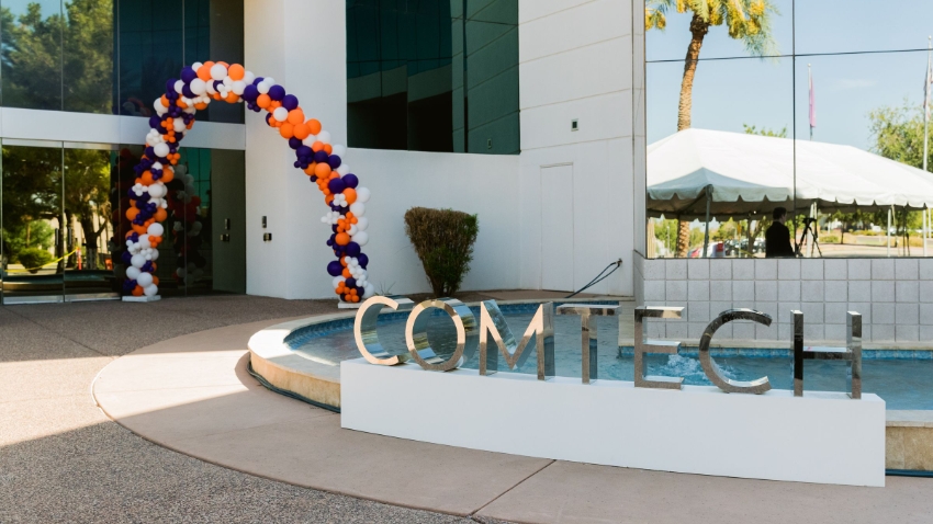 Comtech ribbon cutting