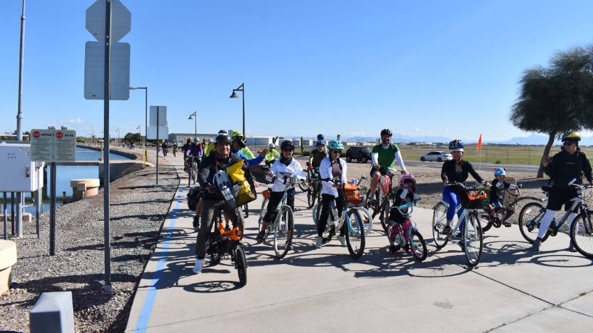 Family Bike Ride: Group along Paseo Trail Stop Sign