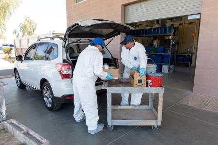 Removing household waste from a vehicle