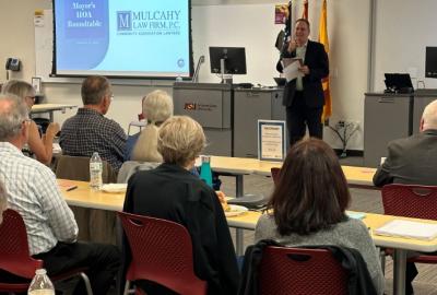 Mayor Hartke speaking at last year's HOA Roundtable event