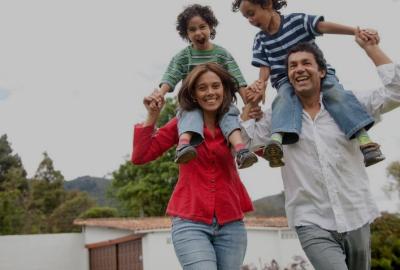 Set of parents with kids on shoulders