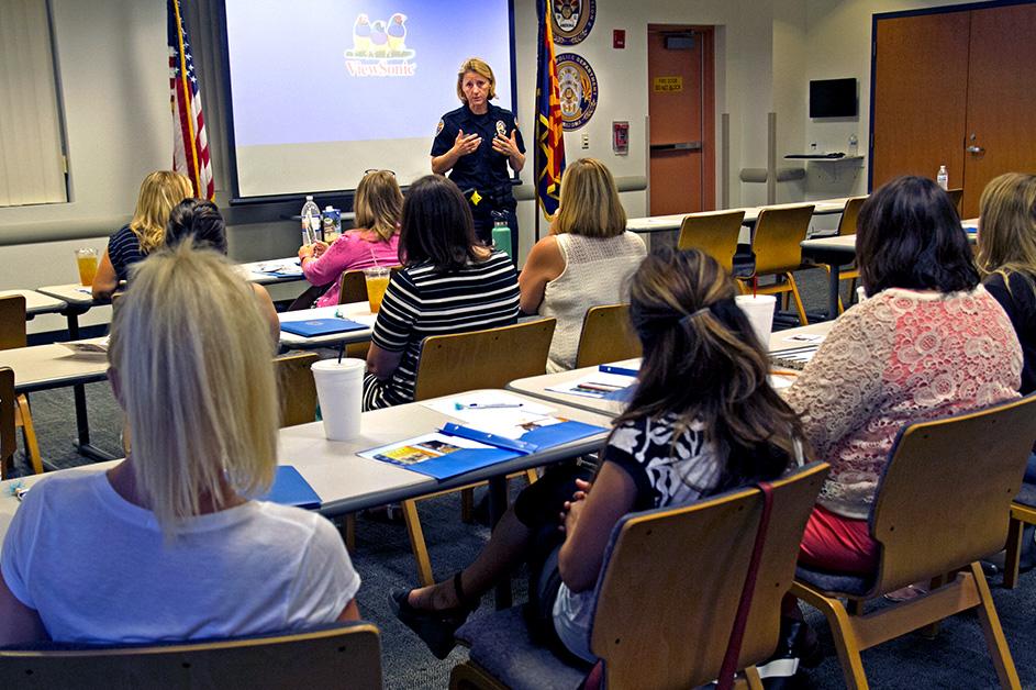 Guardian Academy classroom setting with instructor and participants