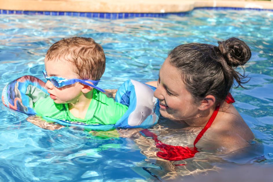 son and mom swimming