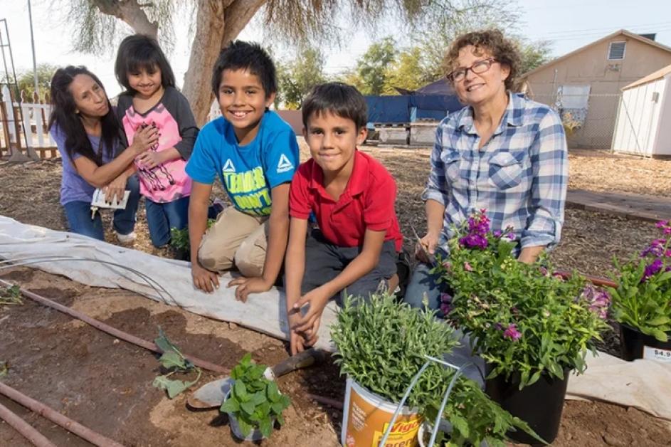 kids helping in a community garden