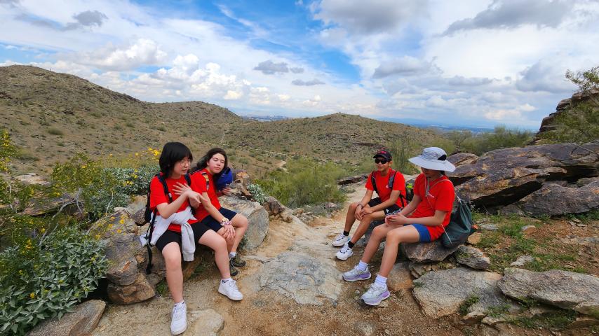 Four teens hiking