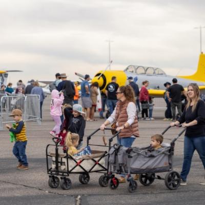 families walking through the aircraft on display at Airport Days