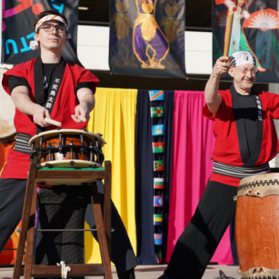 Performers playing two large drums during last year's Multicultural Festival