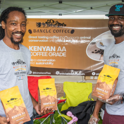 Coffee vendors holding bags of coffee from Kenya during last year's Multicultural Festival