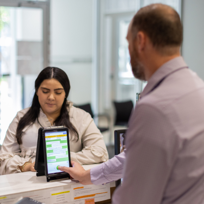 Instant language device in use in Utility Office