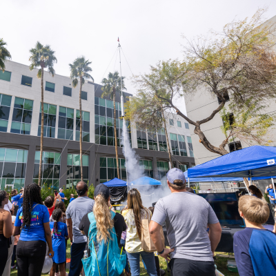 Northrop Grumman employees launch a rocket during the Chandler Innovation Fair