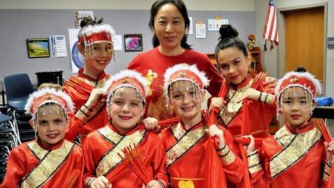 Students from Tarwater Elementary celebrating Chinese New Year using DEI funding